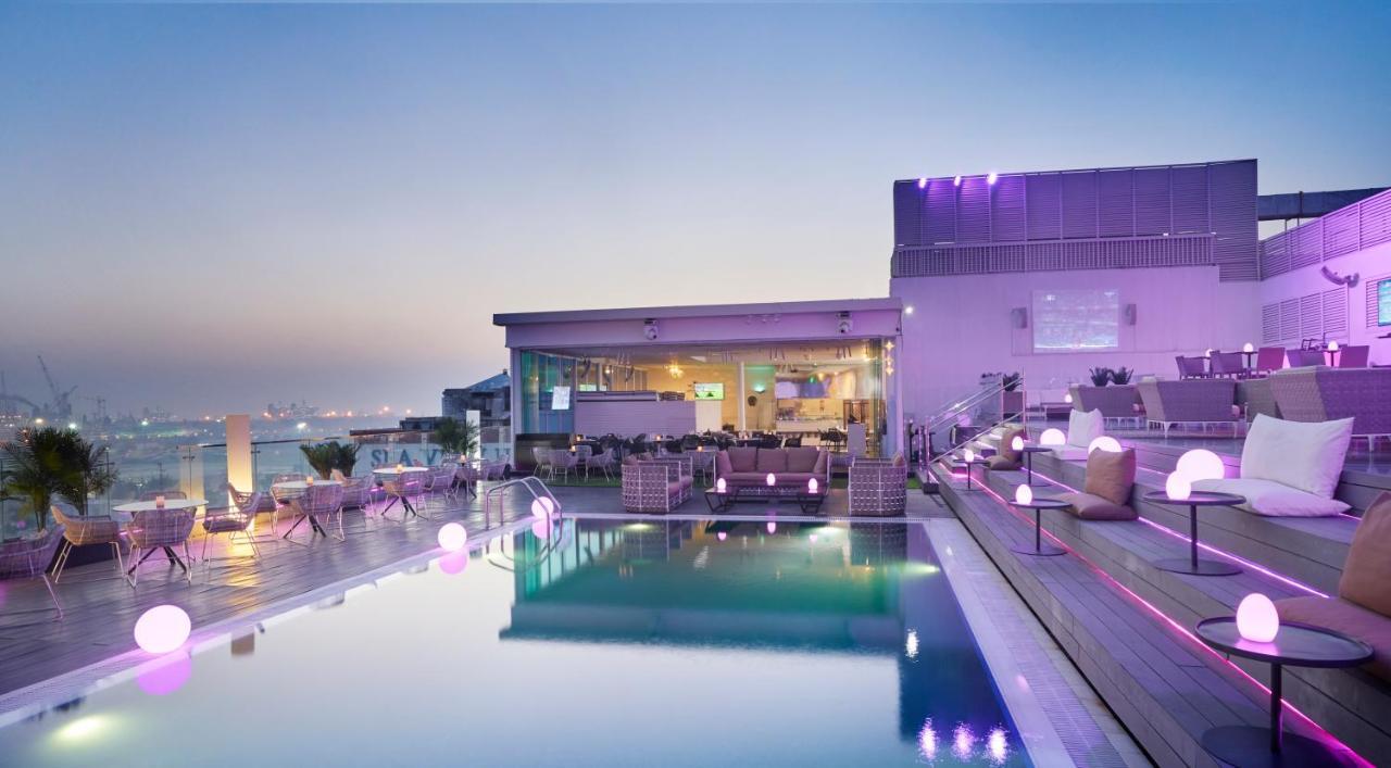 เดอะ แคนวาส โฮเต็ล ดูไบ - เอ็มแกลเลอรี Hotel ภายนอก รูปภาพ The pool at the hotel