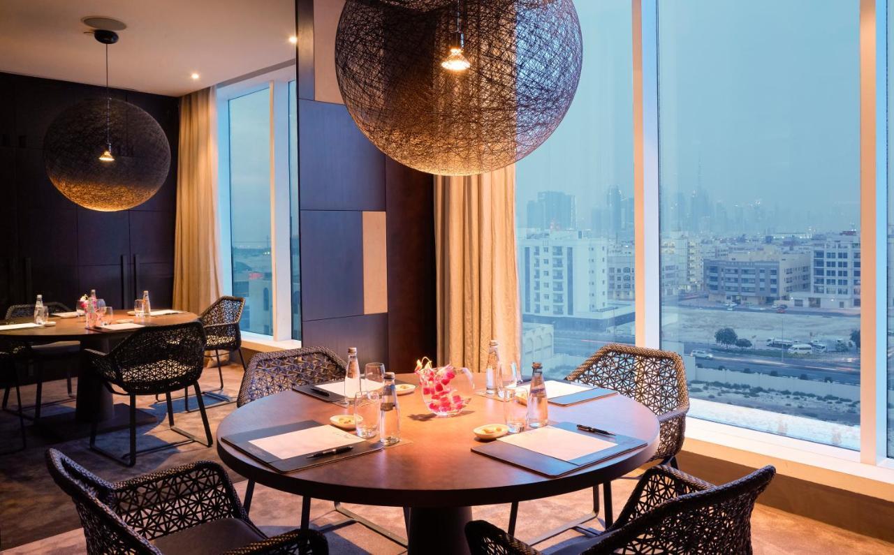 เดอะ แคนวาส โฮเต็ล ดูไบ - เอ็มแกลเลอรี Hotel ภายนอก รูปภาพ The Club Lounge at the Ritz-Carlton, DIFC